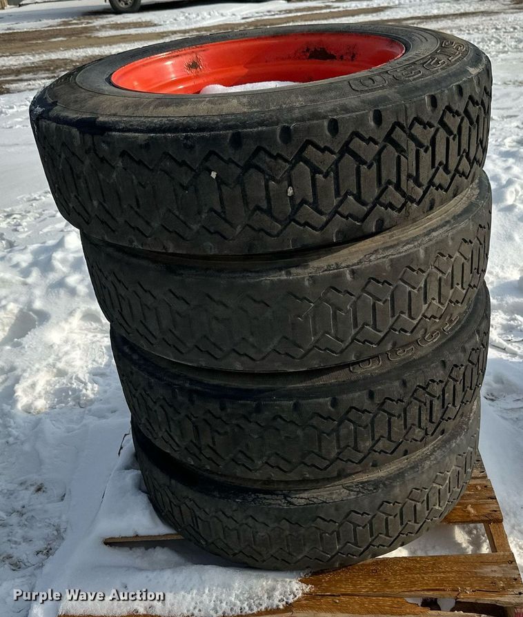 image for item DV0561 (4) 255/70R22.5 skid steer tires and wheels