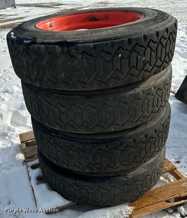 image for item DV0561 (4) 255/70R22.5 skid steer tires and wheels