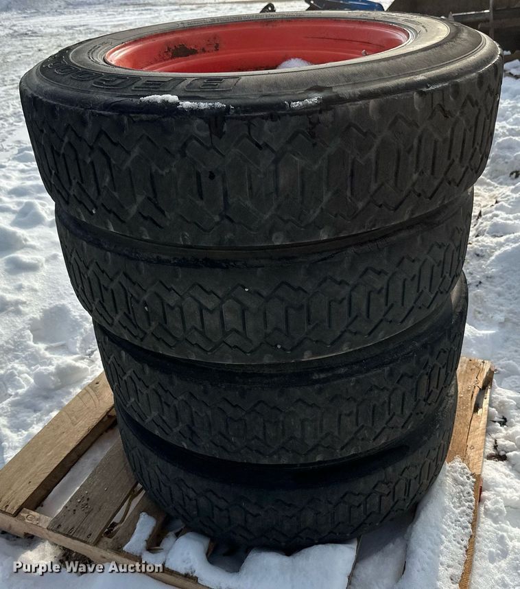 image for item DV0561 (4) 255/70R22.5 skid steer tires and wheels
