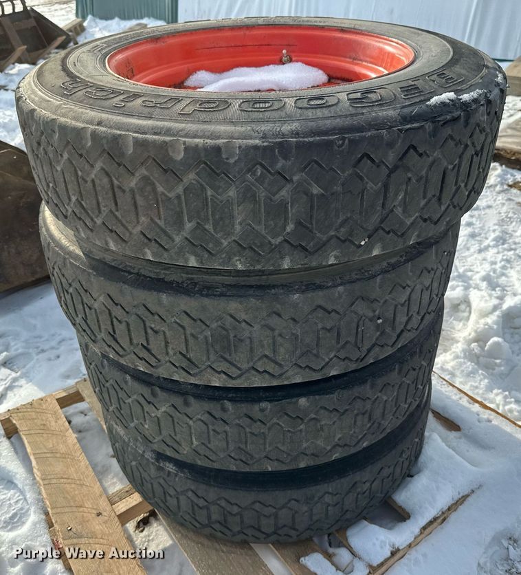 image for item DV0561 (4) 255/70R22.5 skid steer tires and wheels