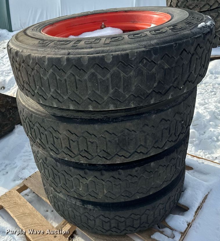image for item DV0561 (4) 255/70R22.5 skid steer tires and wheels