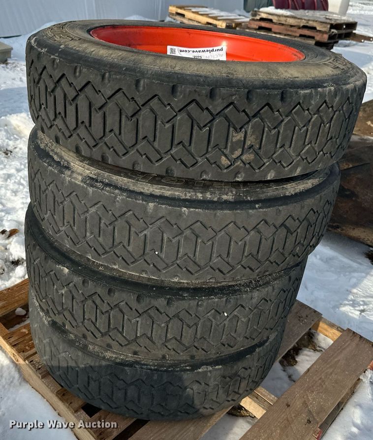 image for item DV0561 (4) 255/70R22.5 skid steer tires and wheels