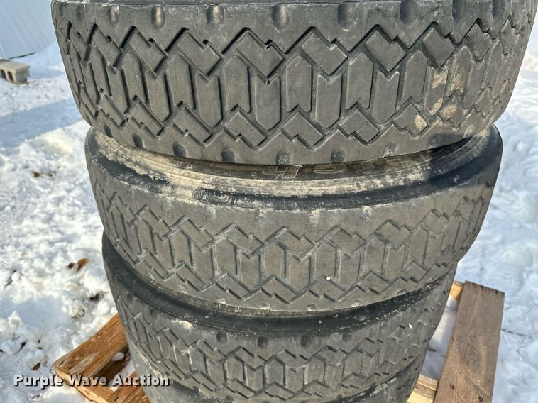 image for item DV0561 (4) 255/70R22.5 skid steer tires and wheels