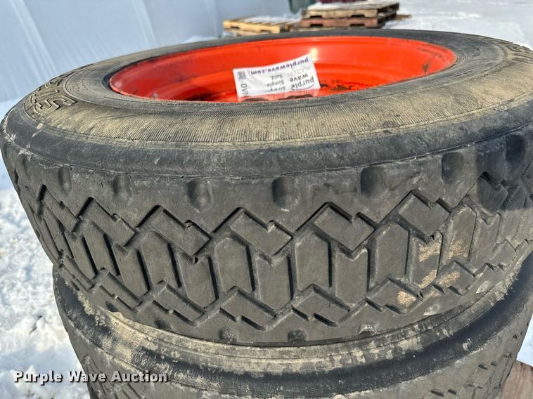 image for item DV0561 (4) 255/70R22.5 skid steer tires and wheels