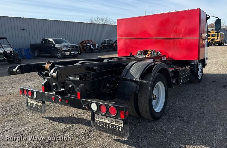 image for item EG2353 2016 Isuzu NPR roll-off container truck