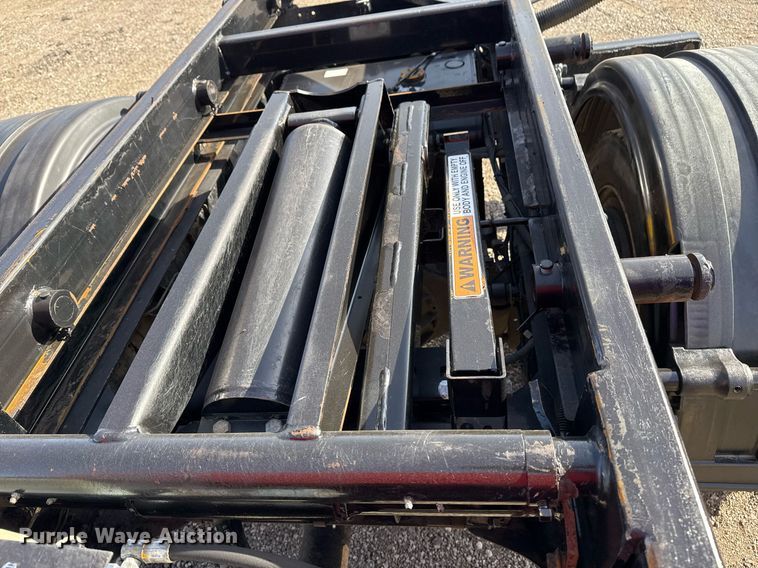 image for item EG2353 2016 Isuzu NPR roll-off container truck