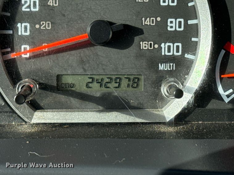 image for item EG2353 2016 Isuzu NPR roll-off container truck