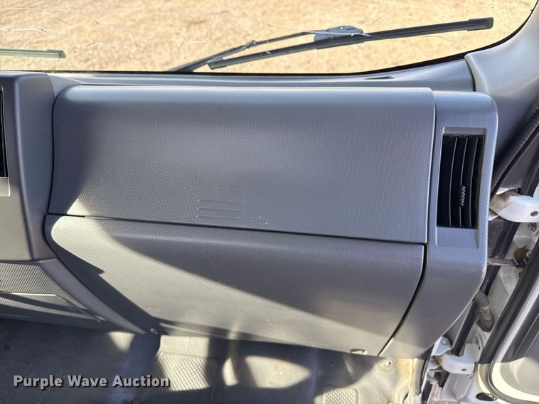 image for item EG2353 2016 Isuzu NPR roll-off container truck