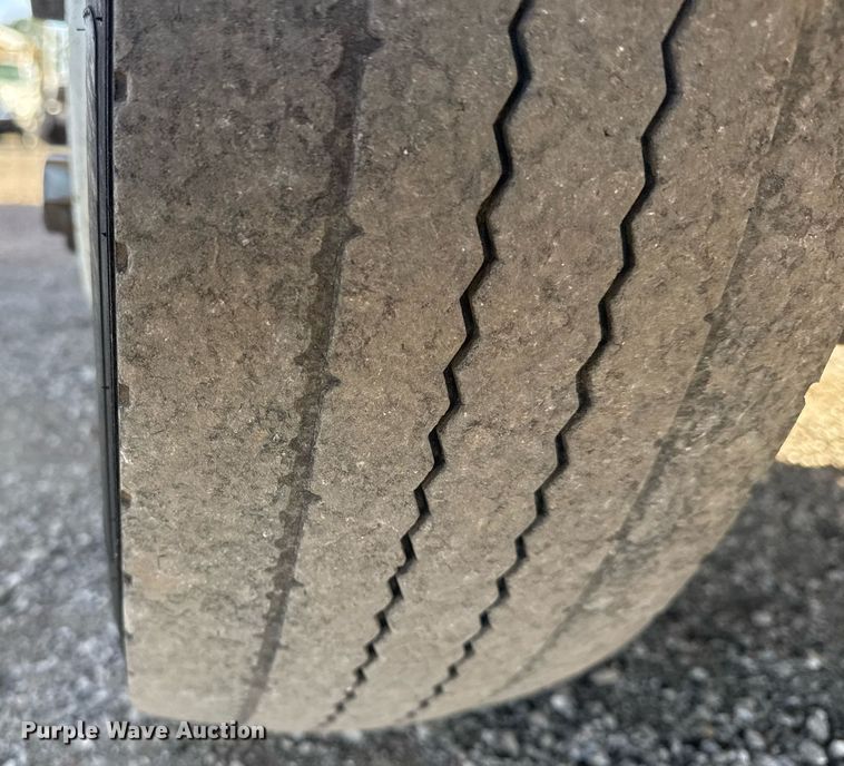 image for item EG2353 2016 Isuzu NPR roll-off container truck