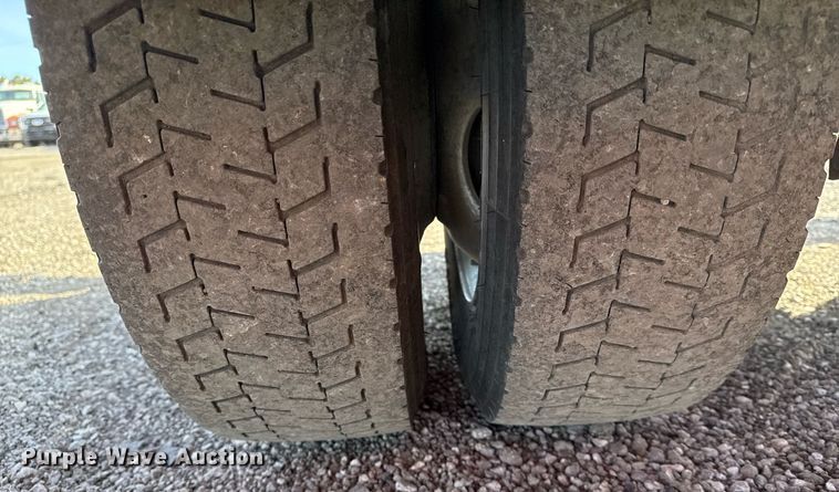 image for item EG2353 2016 Isuzu NPR roll-off container truck