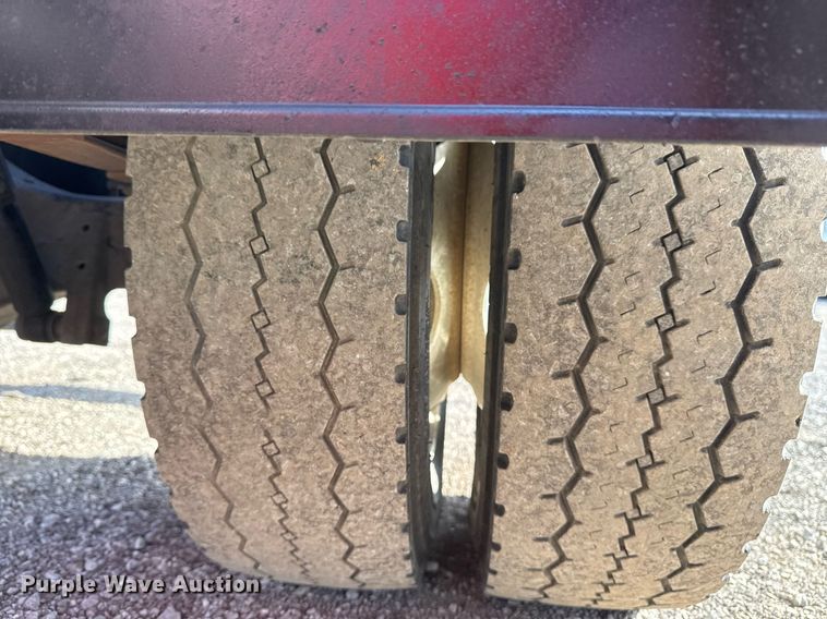 image for item EG2353 2016 Isuzu NPR roll-off container truck