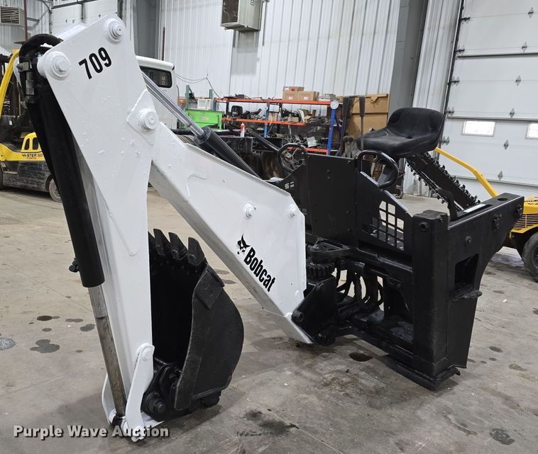 image for item EH8527 Bobcat 709 skid steer backhoe