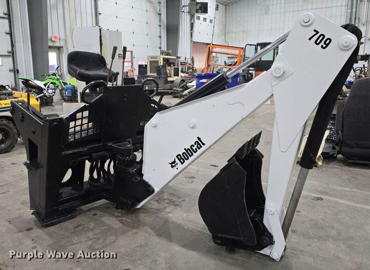 image for item EH8527 Bobcat 709 skid steer backhoe