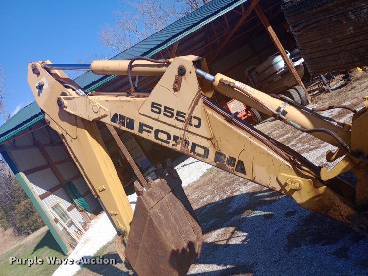 image for item EN8643 1994 New Holland 555D backhoe