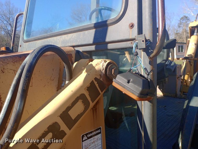 image for item EN8643 1994 New Holland 555D backhoe