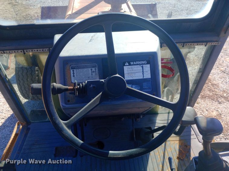 image for item EN8643 1994 New Holland 555D backhoe