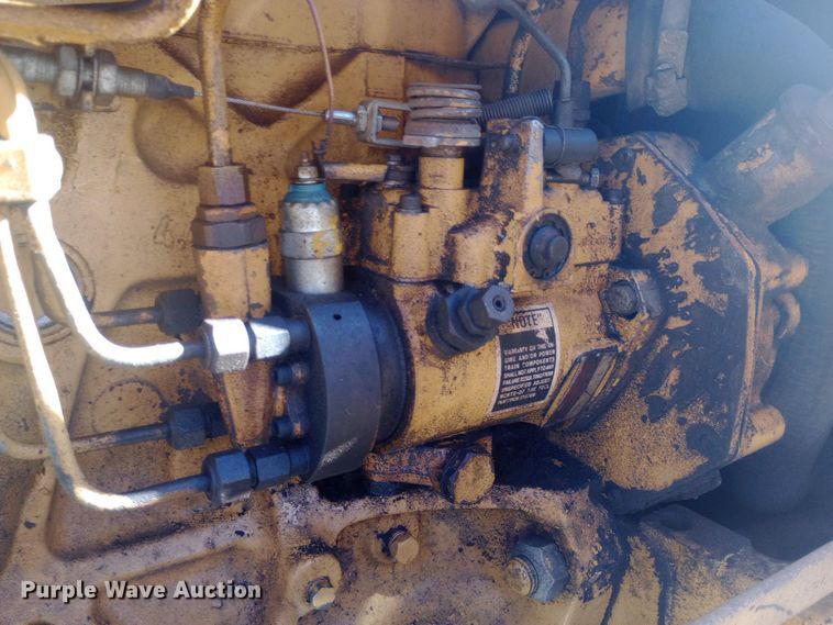 image for item EN8643 1994 New Holland 555D backhoe