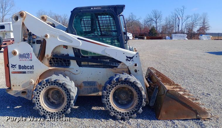 image for item EN8663 2011 Bobcat S750 skid steer loader