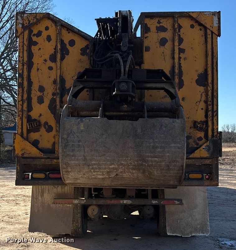 image for item OK9483 2002 Sterling grapple crane truck