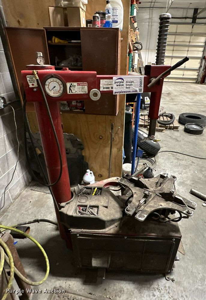 image for item DQ6577 Coat 5060AX rim clamp tire machine 