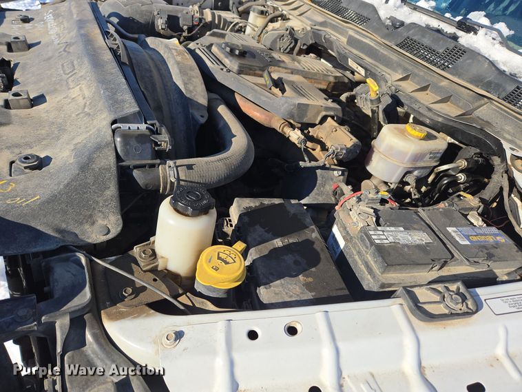 image for item ER5065 2017 Dodge Ram 3500 Crew Cab flatbed pickup truck