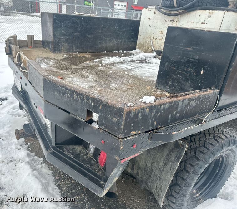 image for item ER5097 2015 Dodge Ram 3500 Crew Cab flatbed pickup truck