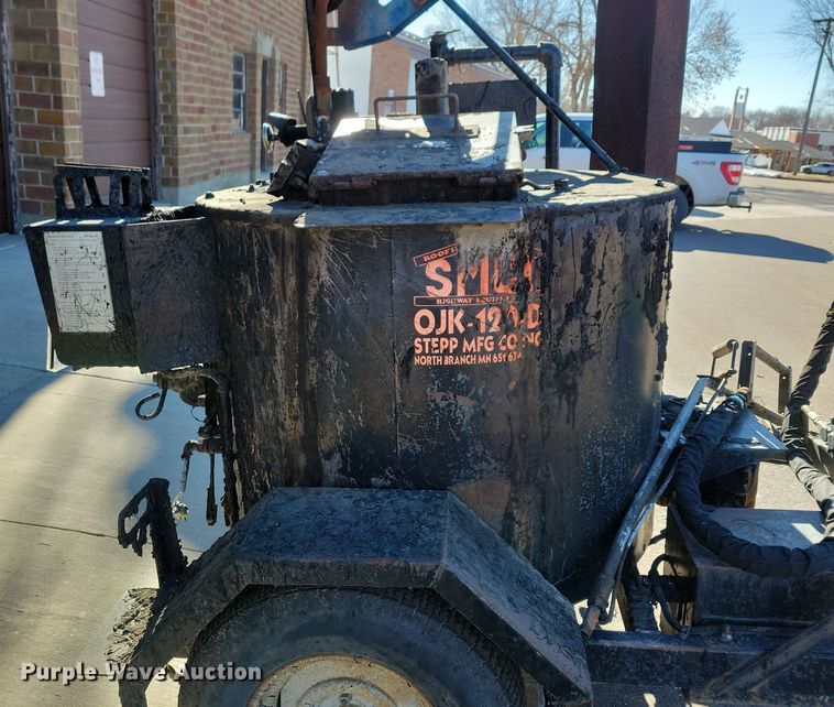 image for item NB9781 1999 SMCI OJK-120D melter applicator