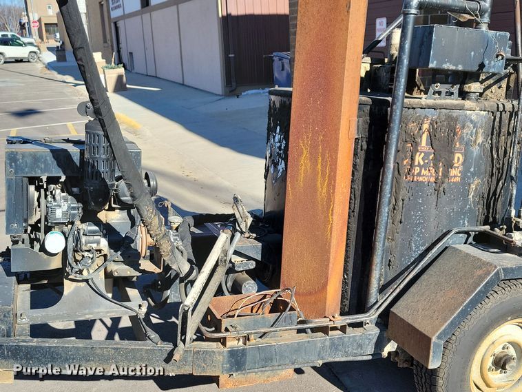 image for item NB9781 1999 SMCI OJK-120D melter applicator