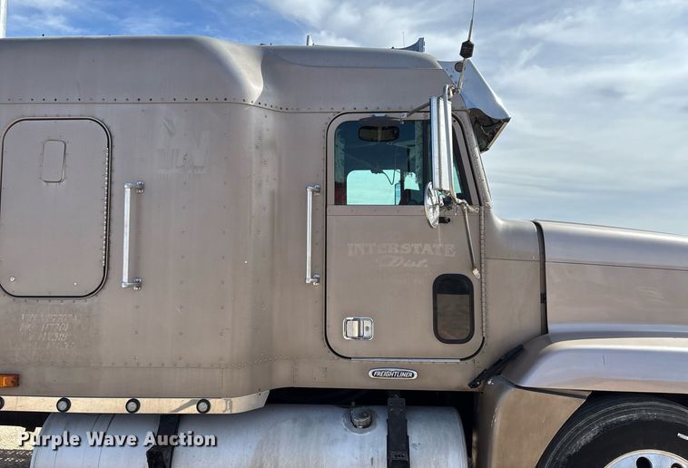 image for item EE0021 1997 Freightliner FLD120 semi truck
