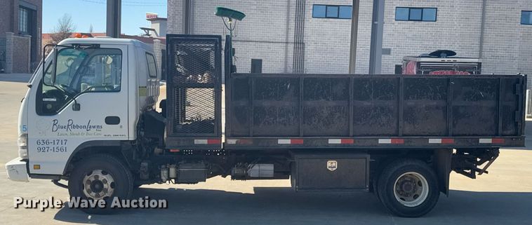 image for item DO0251 2006 Isuzu NPR flatbed truck