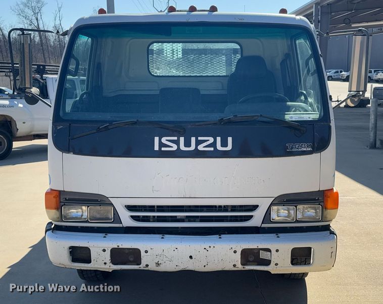 image for item DO0254 2001 Isuzu NQR flatbed truck