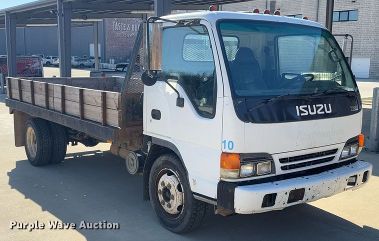 image for item DO0254 2001 Isuzu NQR flatbed truck