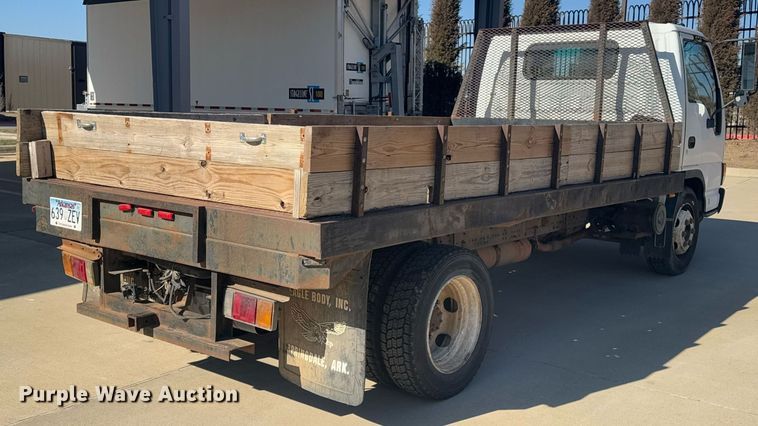 image for item DO0254 2001 Isuzu NQR flatbed truck