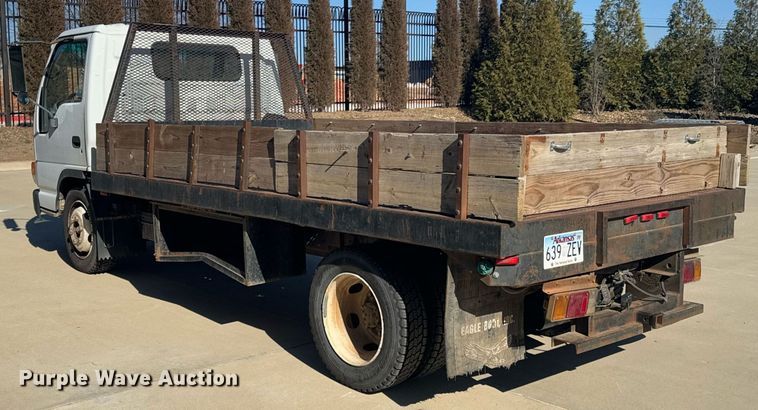 image for item DO0254 2001 Isuzu NQR flatbed truck