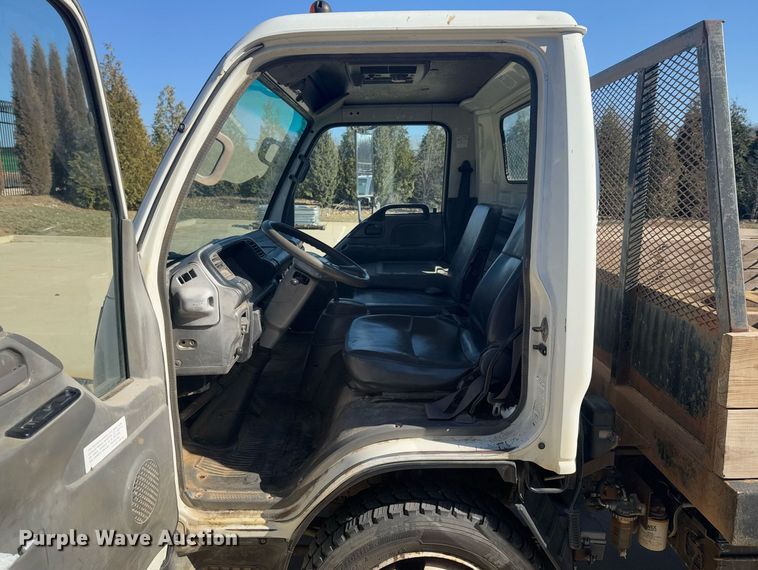 image for item DO0254 2001 Isuzu NQR flatbed truck