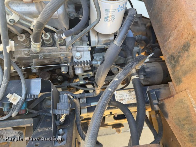 image for item DO0254 2001 Isuzu NQR flatbed truck