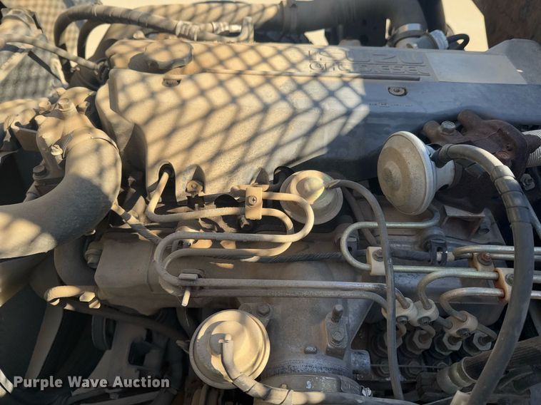 image for item DO0254 2001 Isuzu NQR flatbed truck