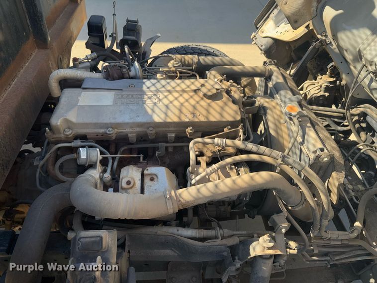 image for item DO0254 2001 Isuzu NQR flatbed truck