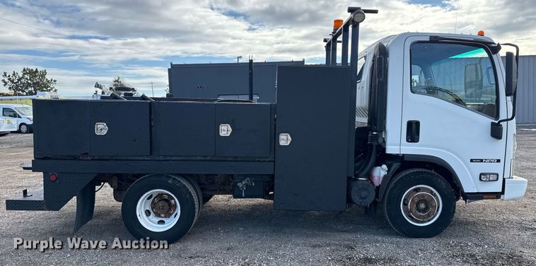 image for item EG2492 2014 Isuzu NPR flatbed truck