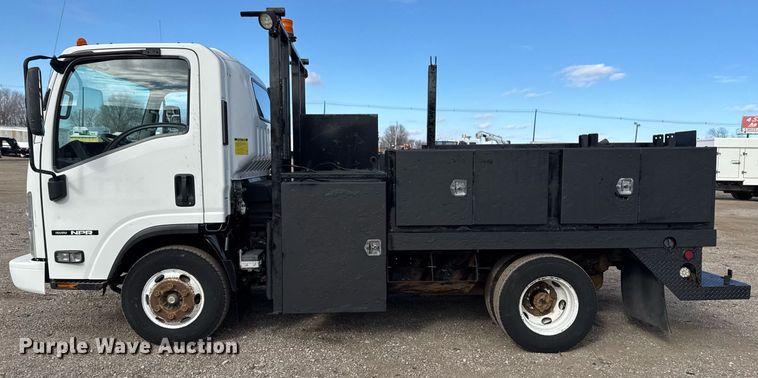 image for item EG2492 2014 Isuzu NPR flatbed truck