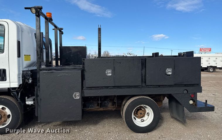 image for item EG2492 2014 Isuzu NPR flatbed truck