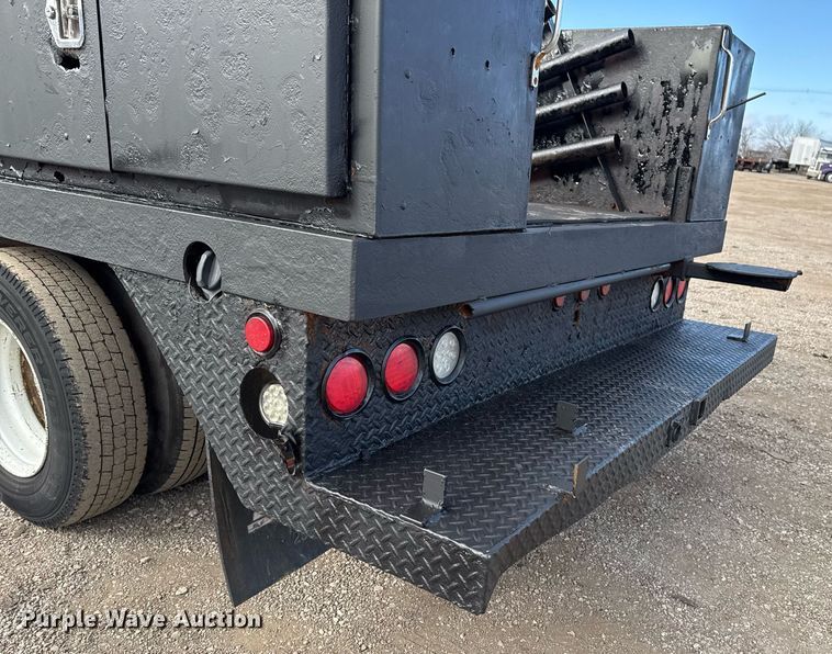 image for item EG2492 2014 Isuzu NPR flatbed truck