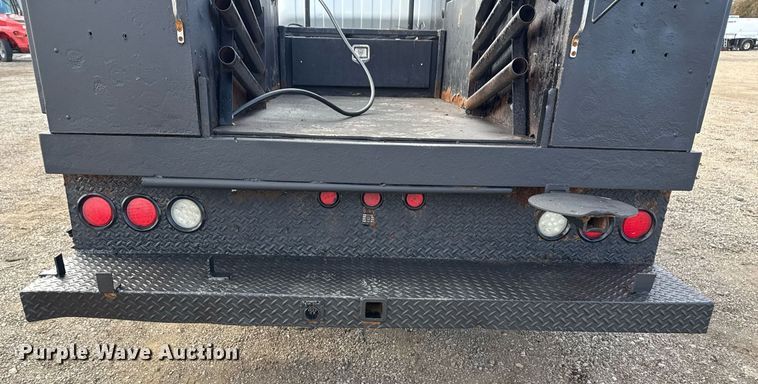 image for item EG2492 2014 Isuzu NPR flatbed truck