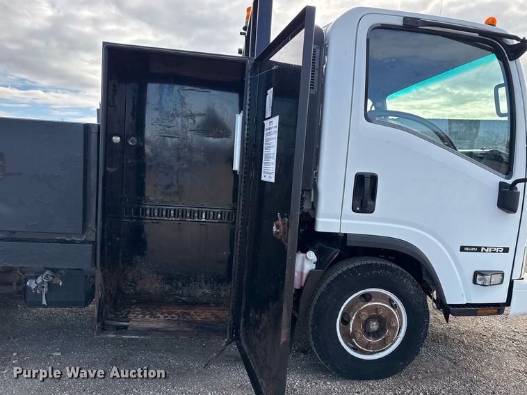 image for item EG2492 2014 Isuzu NPR flatbed truck