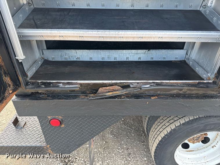 image for item EG2492 2014 Isuzu NPR flatbed truck