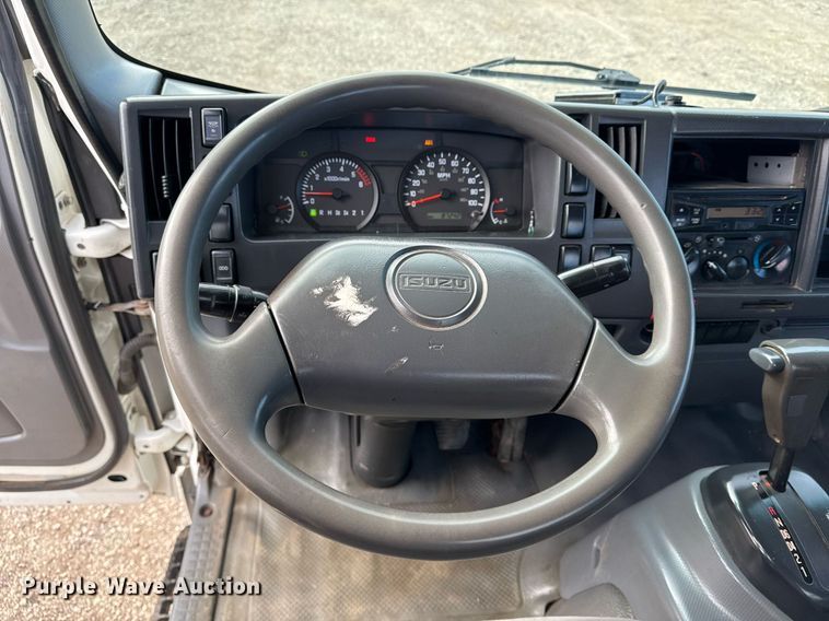 image for item EG2492 2014 Isuzu NPR flatbed truck