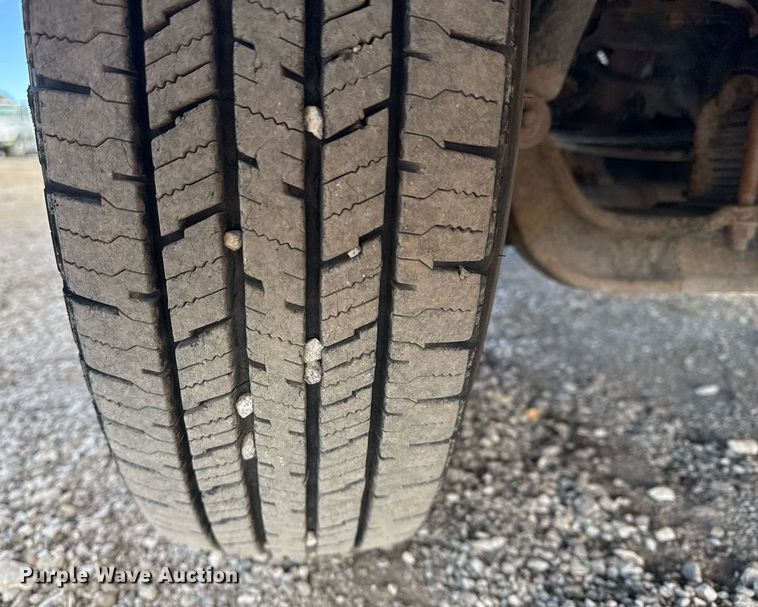 image for item EG2492 2014 Isuzu NPR flatbed truck