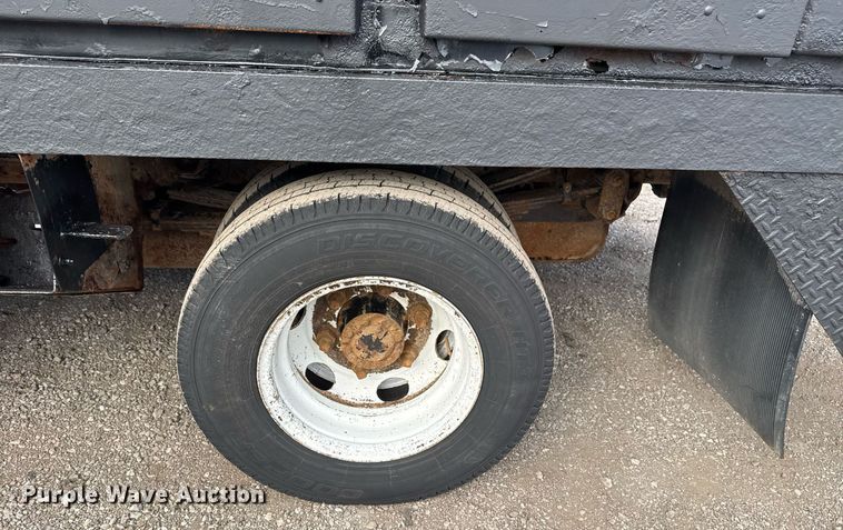 image for item EG2492 2014 Isuzu NPR flatbed truck