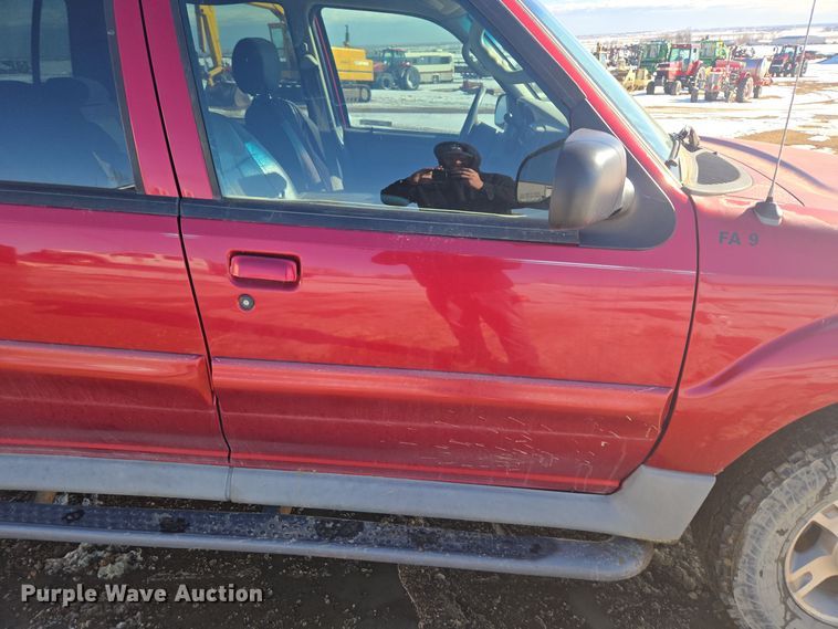 image for item ER5120 2003 Ford Explorer Sport Trac pickup truck