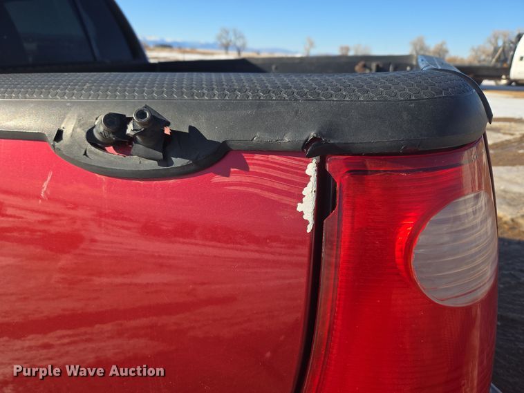 image for item ER5120 2003 Ford Explorer Sport Trac pickup truck